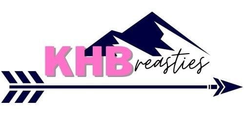 KHB Breasties font with navy blue mountain peaks in the back and arrow below