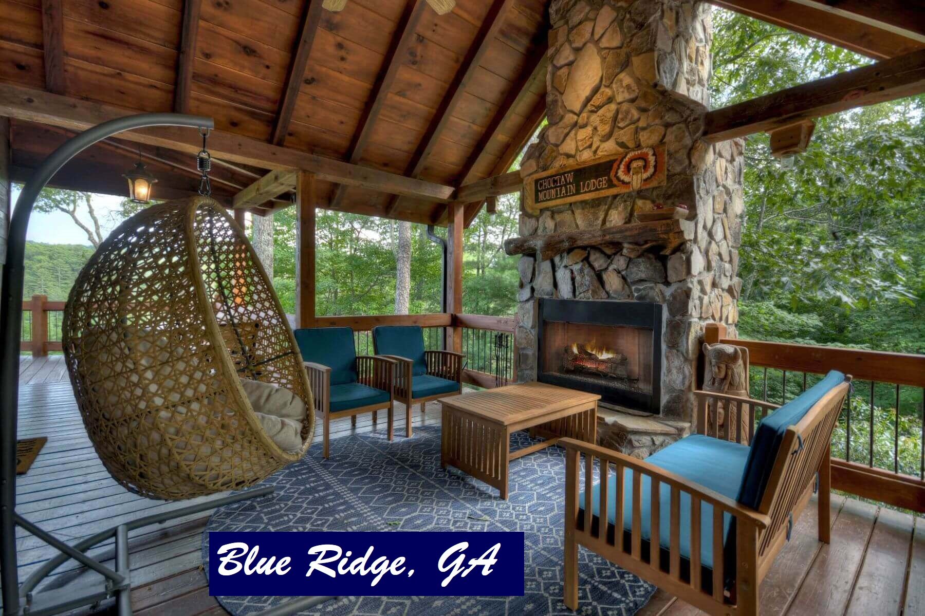 Outdoor fireplace at Choctaw Mountain Lodge in Blue Ridge, GA one of our vacation rental homes