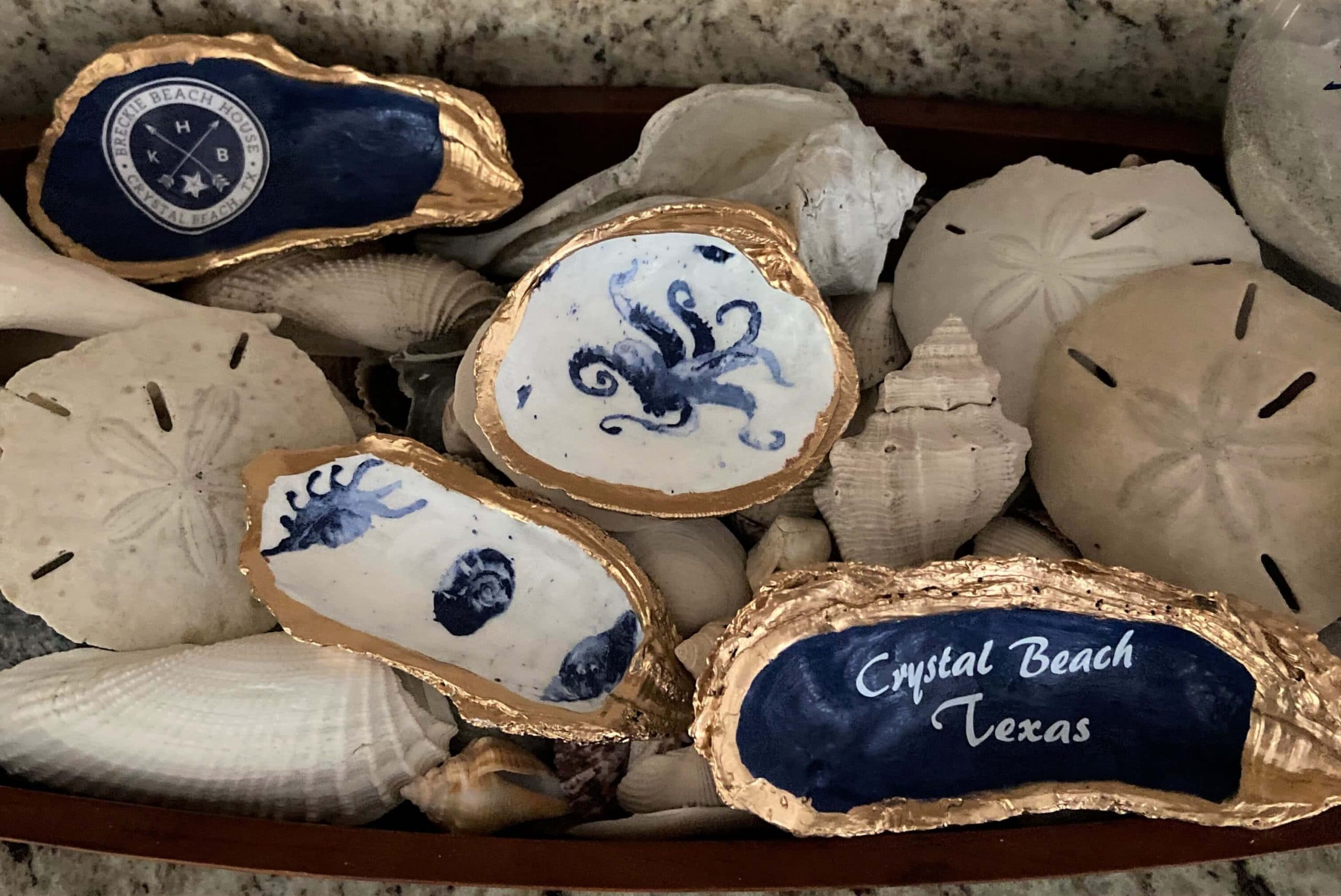 Decoupage and painted sea shells in a decorative tray